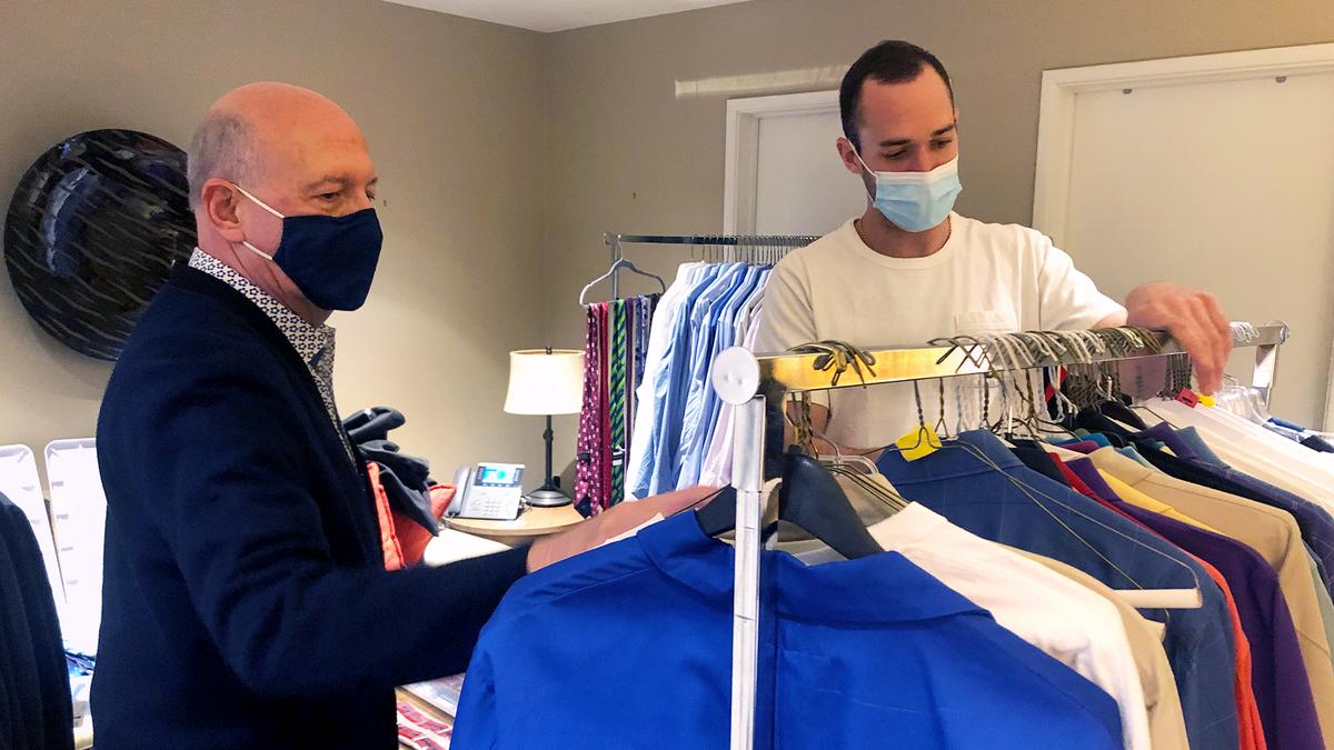 Alex’s son Matthew Trebek and Jeopardy! Costumer Steven Zimbelman pack Alex Trebek’s wardrobe for donation to The Doe Fund.