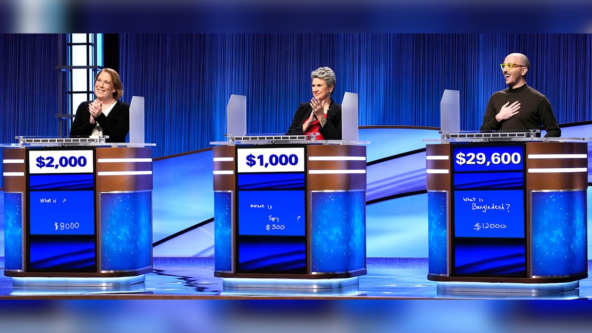 From left: Amy Schneider, Janice Hawthorne Timm and Rhone Talsma behind the Jeopardy! contestant podiums
