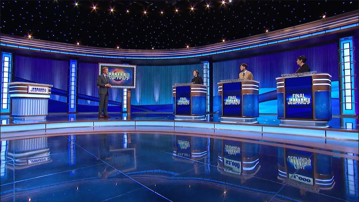 Ken Jennings and contestants Mattea Roach, Julian Glander, and Terri Huggins on set. 