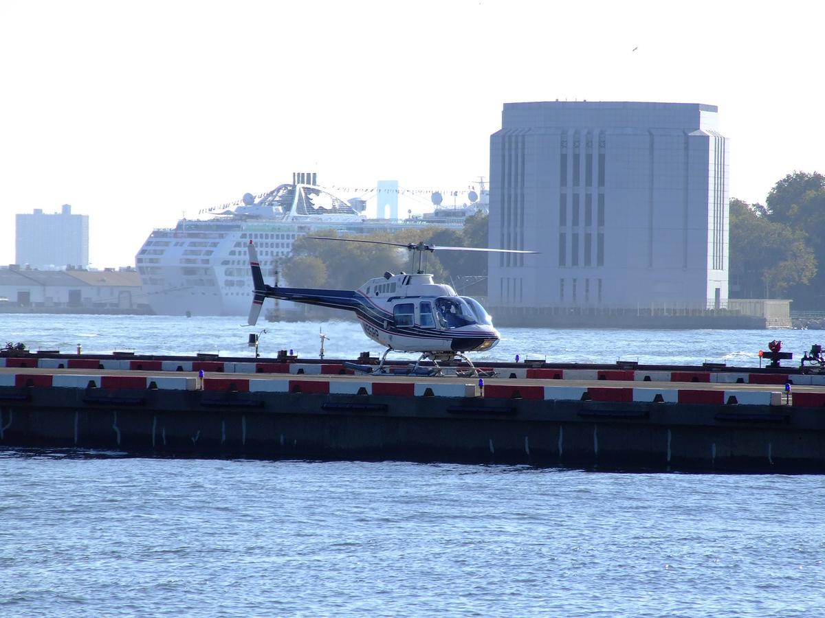 Helicopter lands on heliport 