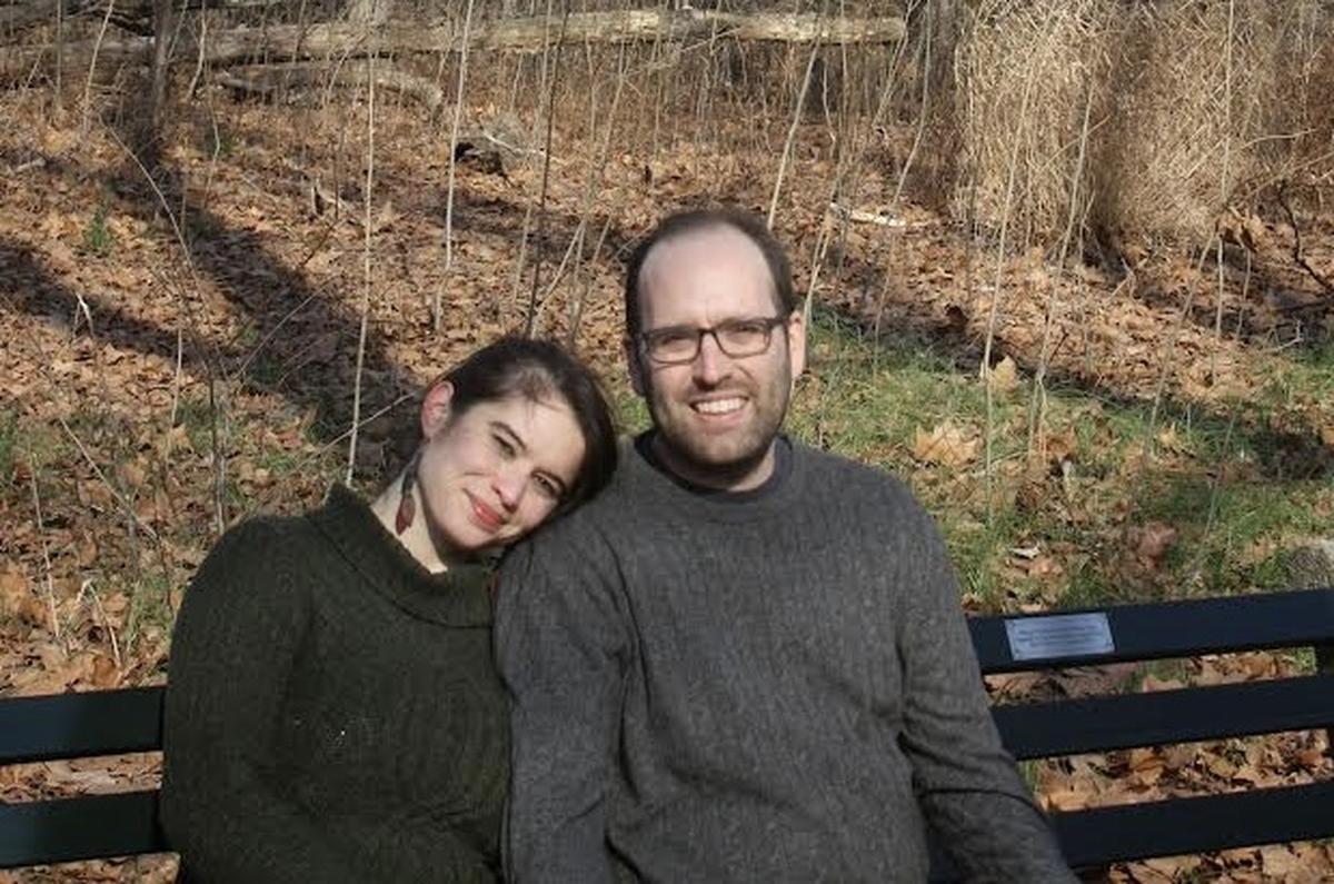 Megan Wachspress and her husband Nathan sit on their engagement bench in Central Park. 