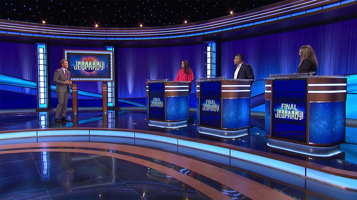 Ken Jennings and contestants Emily Fiasco, William Chou, and Erica Weiner-Amachi on the set of Jeopardy!