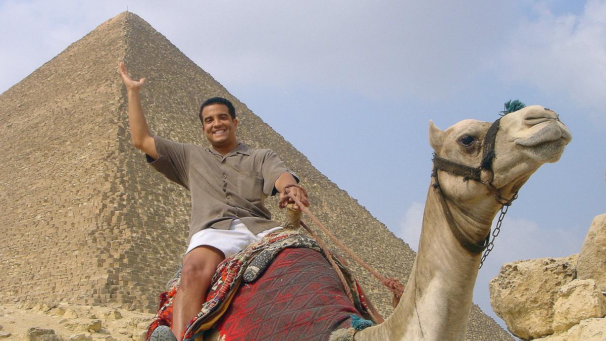 Jimmy McGuire rides a camel