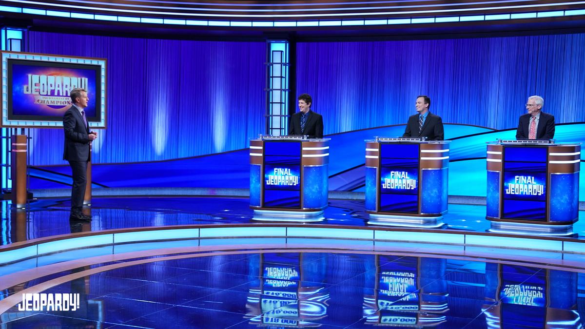 Ken Jennings with Matt Amodio, John Focht and Sam Buttrey on the Alex Trebek Stage.