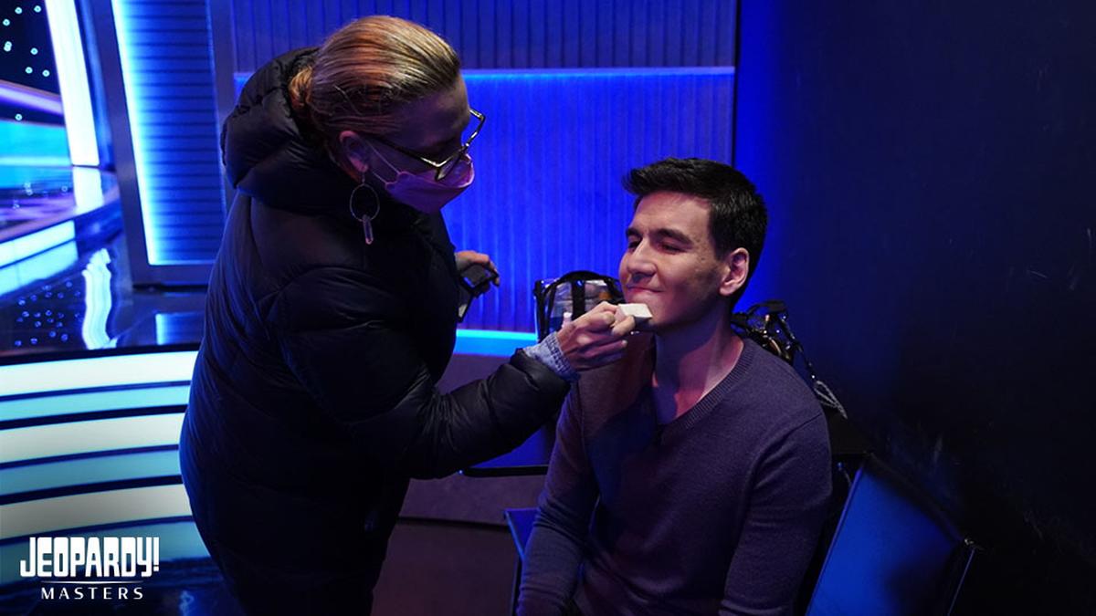 James Holzhauer receives a touch up backstage.