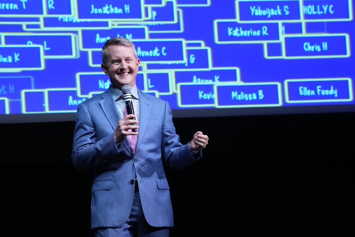 Ken Jennings hosting an interactive version of Jeopardy! on the Inside Jeopardy! Live Tour. 