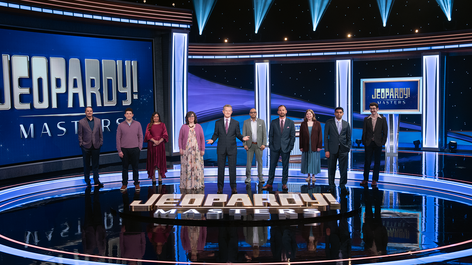 Ken Jennings with all nine 2025 Masters Contestants on The Alex Trebek Stage