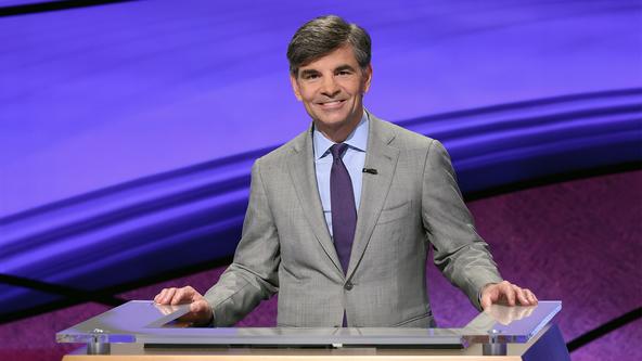 George Stephanopoulos behind the Jeopardy! lectern