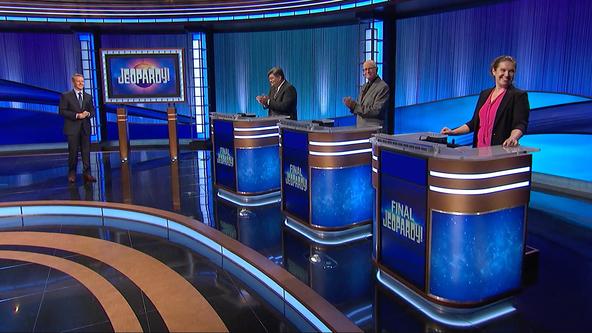 Ken Jennings on set with contestants Luigi de Guzman, Tim Faulkner, and Katherine May