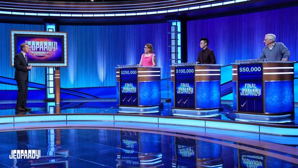 Ken Jennings with Amy Schneider, Andrew He and Sam Buttrey on the Alex Trebek Stage.