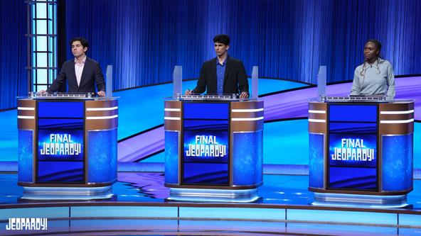 Jeopardy! High School Reunion Tournament contestants Lucas Miner, Anish Maddipoti, and Audrey Satchivi on the Alex Trebek Stage.
