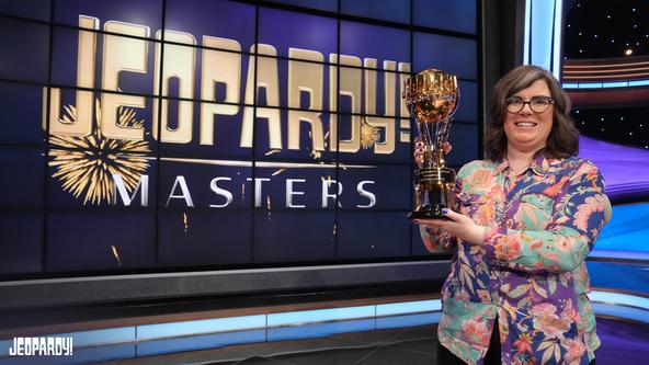 2024 Jeopardy! Masters champion Victoria Groce holds the Trebek Trophy.