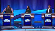 Contestants Ryan Long, Lucia Yang and Wyatt Yankus on stage behind their contestant poduims.