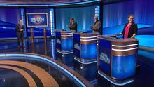 Ken Jennings on set with contestants Luigi de Guzman, Tim Faulkner, and Katherine May